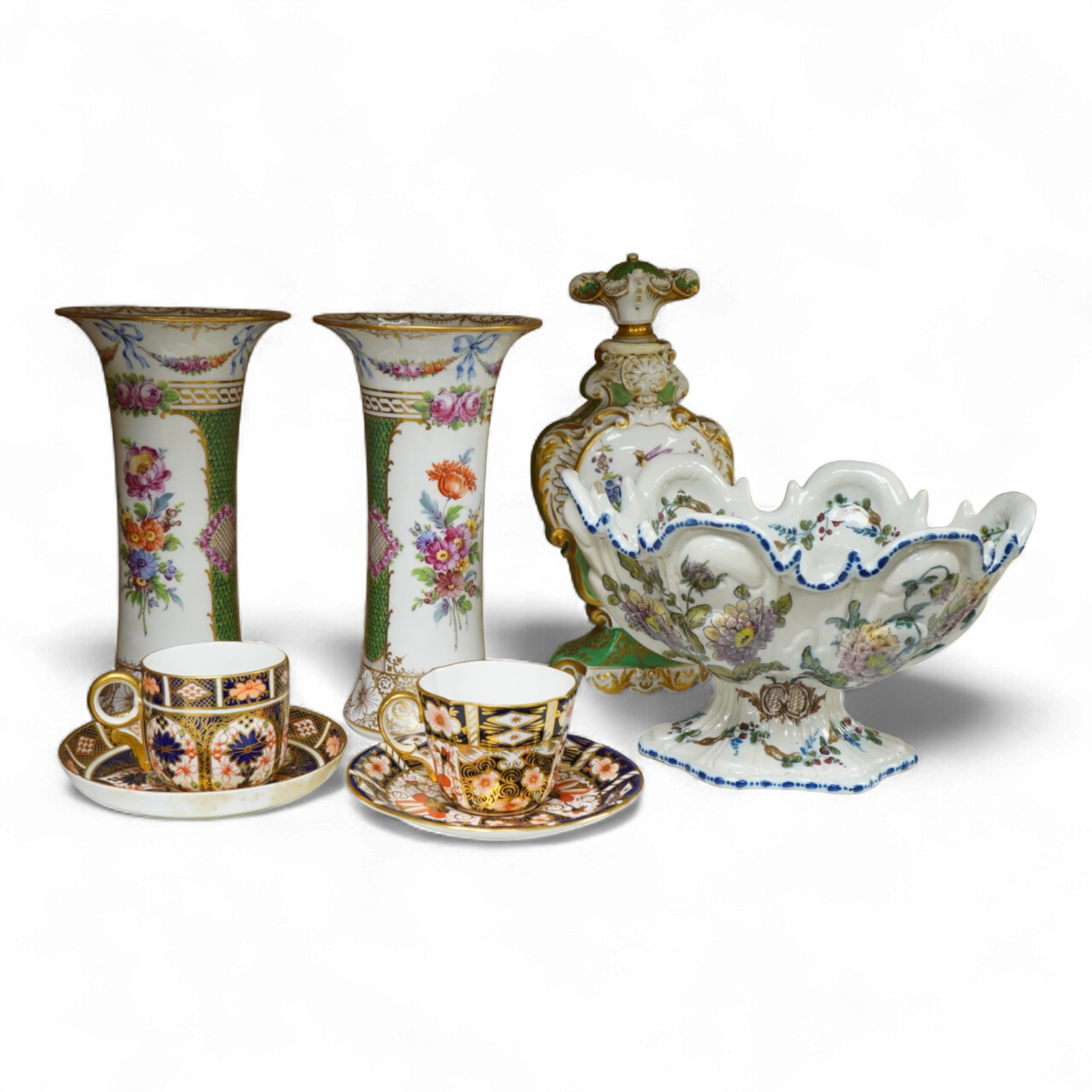 A pair of Dresden vases, a Paris porcelain bottle and stopper, a faience bowl and two Royal Crown Derby cups and saucers, tallest 26cm
